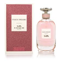 Coach Dreams Sunset pink perfume bottle and rose-colored box